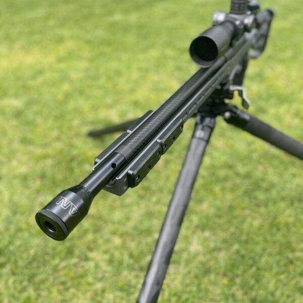 MANAEL Bloop Tube and Barrel Tuner on Bergara B14 with MDT ACCa Chassis Precision Australian-made rifle gear with scope and bipod on grassy field.
