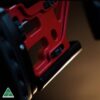 Rapid Adjust Thumbwheels with detent to adjust integrated bag rider
